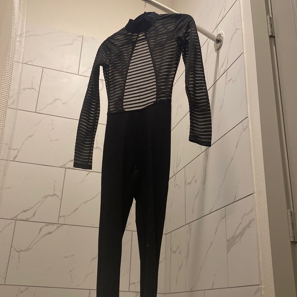 Black jumpsuit. Size: Small. Mesh top half.